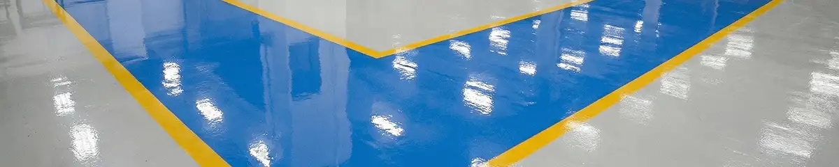 A factory floor professionally covered and marked with epoxy flooring in Yonkers, NY