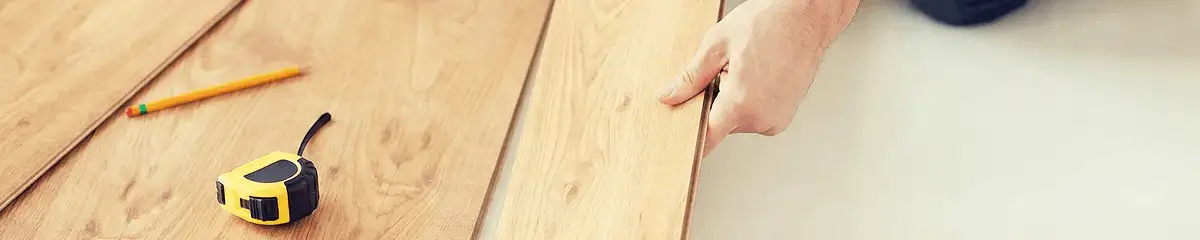 A professional installing wood flooring in Yonkers, NY