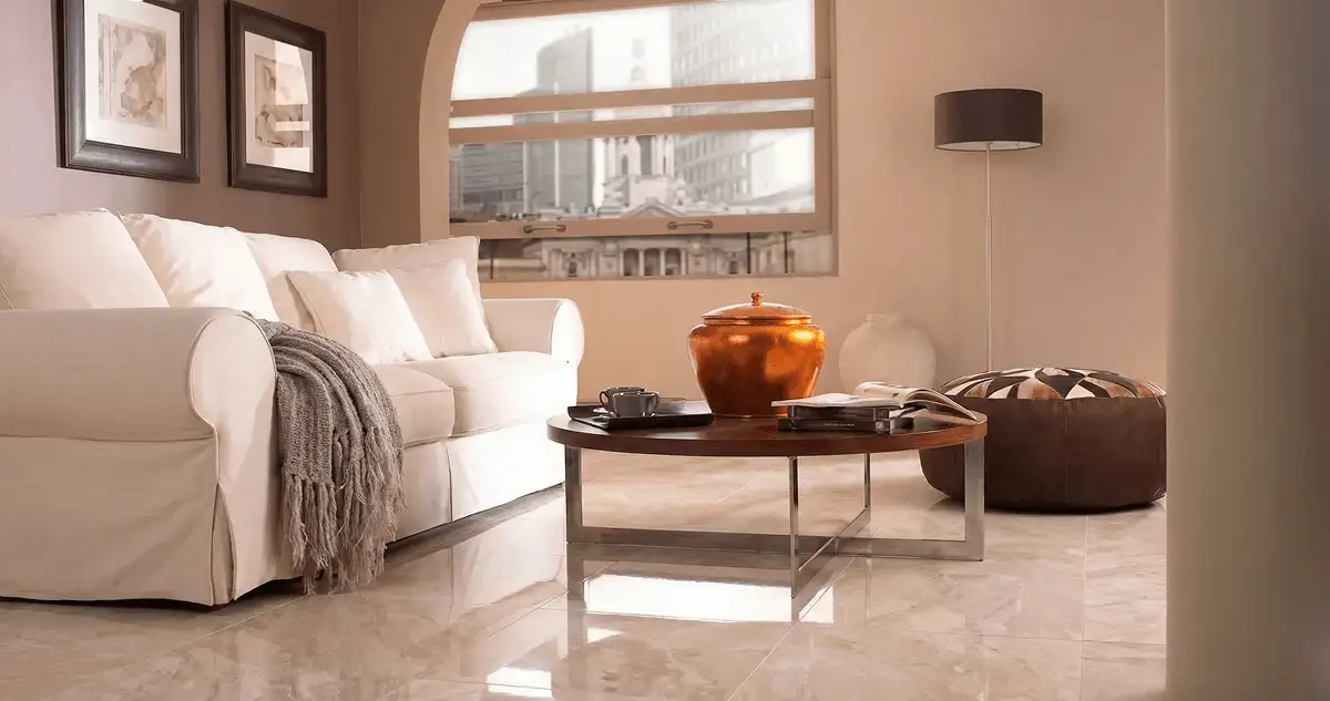 Modern living room with professionally installed marble flooring, a beige sofa, coffee table in Yonkers, NY
