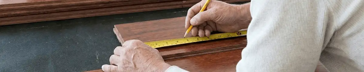 A professional installing wood flooring in Yonkers, NY